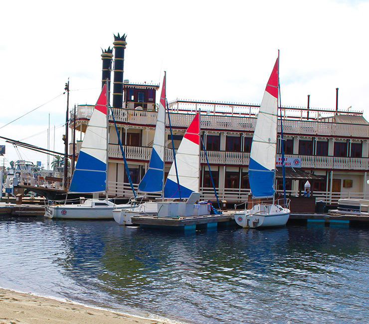 Sailboats from Action Sport Rentals at Bahia Beach and Boat Club on Mission Bay in San Diego